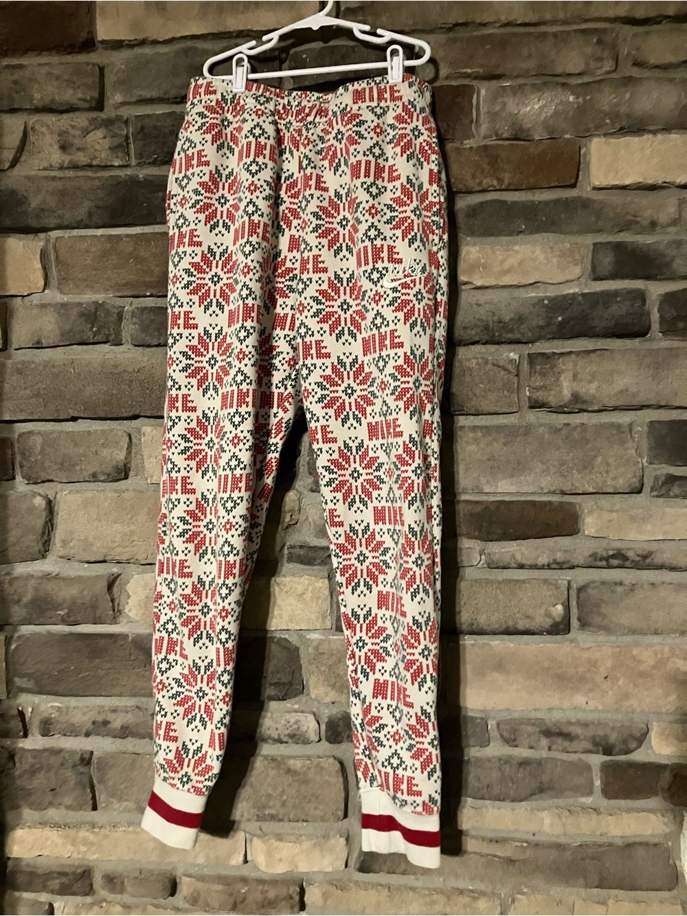 Nike Sportswear Club Fleece jogger pants with a red and green fair isle  pattern